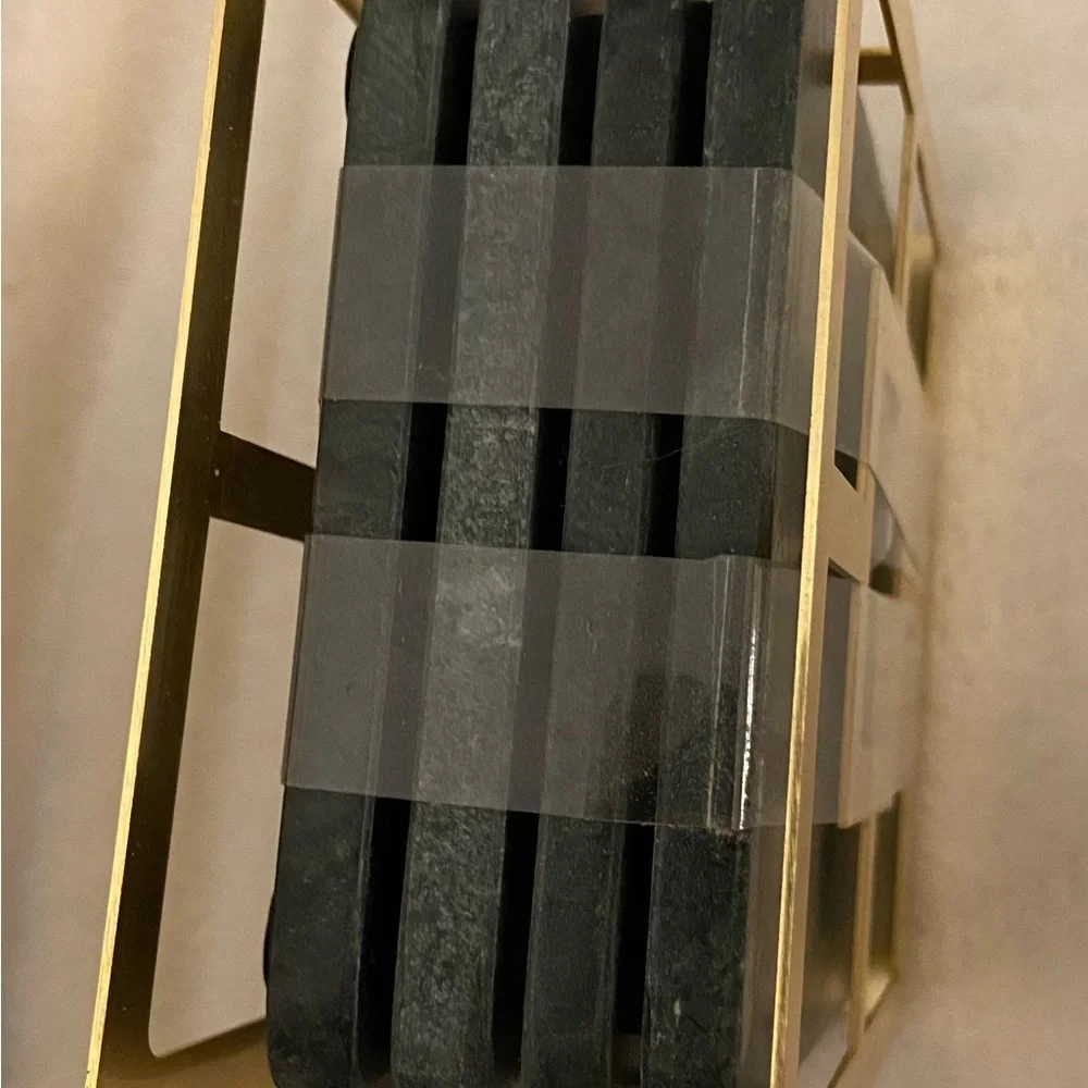 Dark green marbled ceramic coasters with gold holder. 4x4